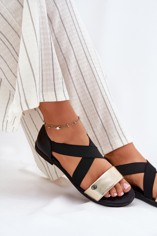 Flache Sandalen für Damen Z Elastycznymi Paskami SchZuarz und-goldene Farbe Es mussrinea Flache Sandalen für Damen Z Elastycznymi Paskami SchZuarz und-goldene Farbe Es mussrinea