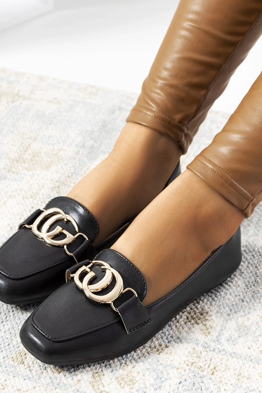 Schwarze Loafer mit goldener Schnalle...