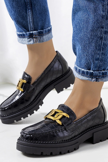 Schwarze Mokassins auf hoher Sohle, „Zanen"