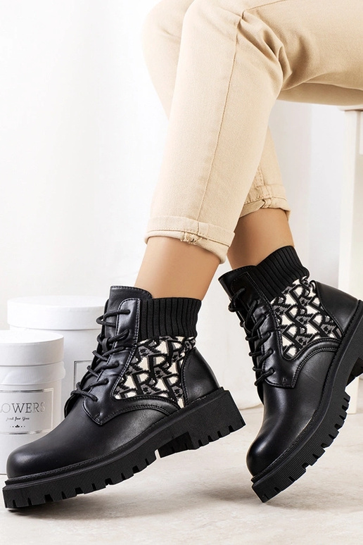 Schwarze Stiefeletten mit elastischem...