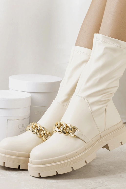 Beige Stiefeletten mit hoher Sohle...