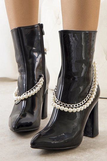 Schwarze Lackstiefeletten... 2