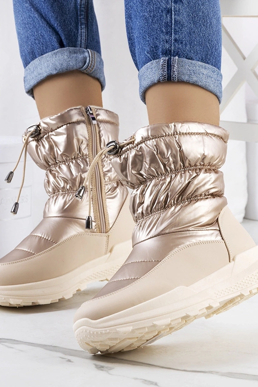 Goldene Winterstiefel mit...