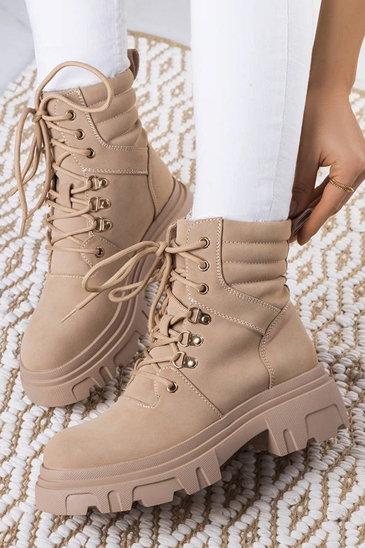 Beige Stiefeletten mit massiver...