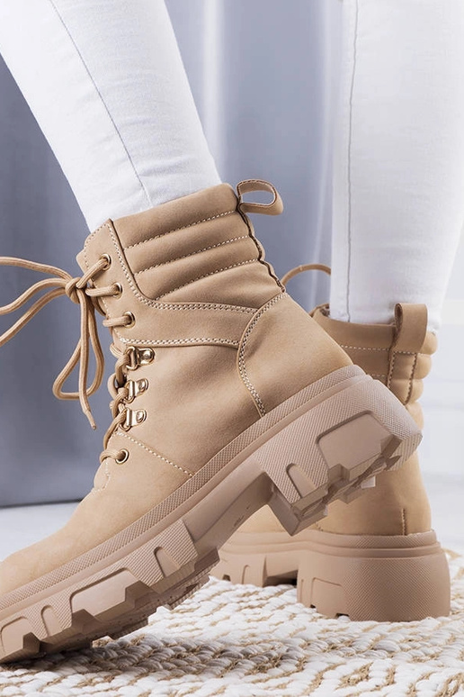 Beige Stiefeletten mit massiver...