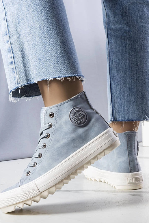 Blaue isolierte Sneakers Big Star...