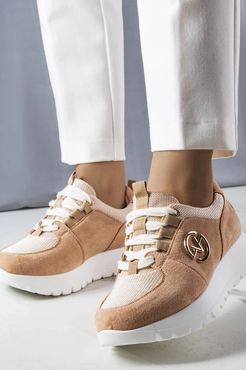 Sandfarbene Sportschuhe mit...