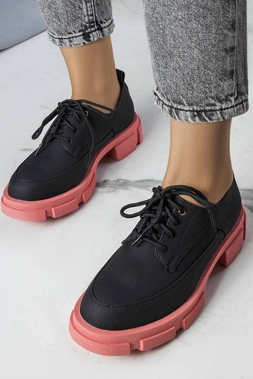 Schwarze Stiefeletten mit massiver...