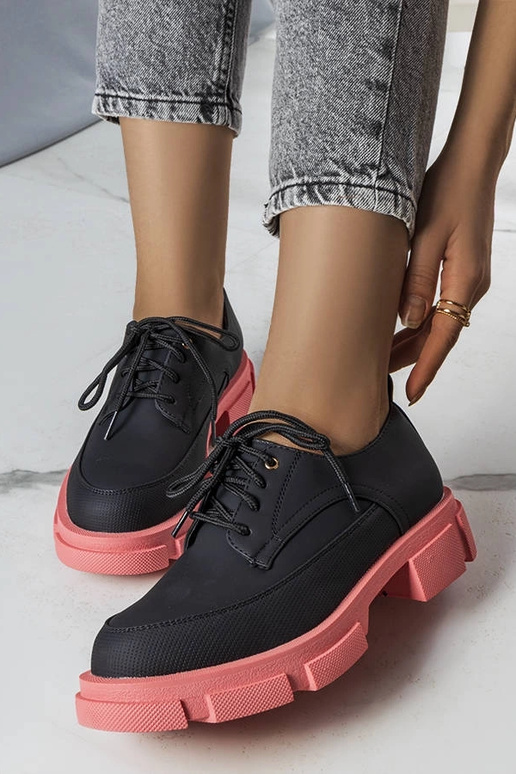 Schwarze Stiefeletten mit massiver...