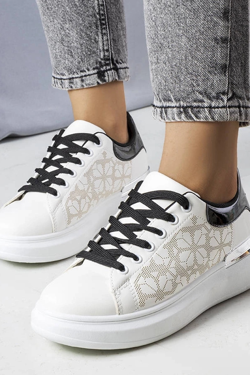 Schwarze und weiße perforierte...