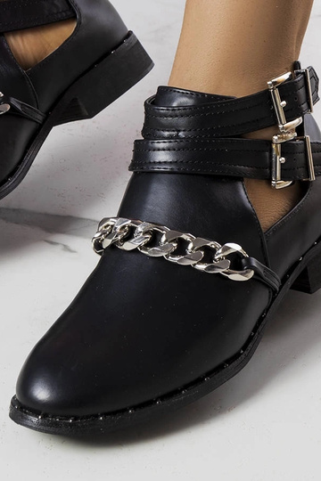 Schwarze Stiefeletten mit Cut-Outs und Ratté-Muster