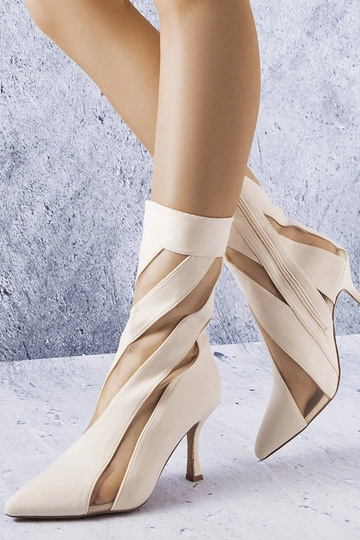 Sandfarbene Stiefel mit...