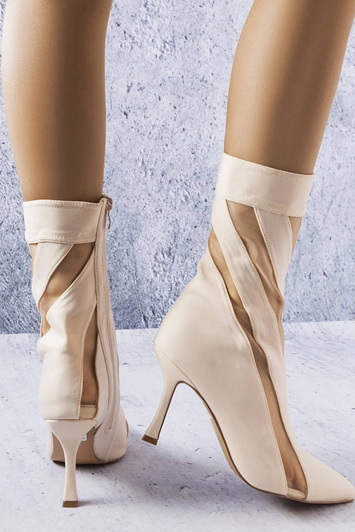 Sandfarbene Stiefel mit transparenten...