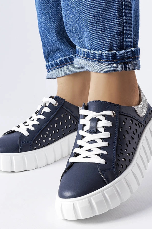 Dunkelblaue Sportschuhe mit... Dunkelblaue Sportschuhe mit...