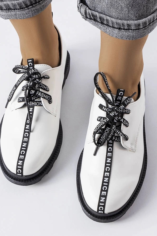 Weiße Stiefeletten mit...