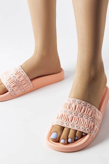 Rosa Flip-Flops mit Rüschen...