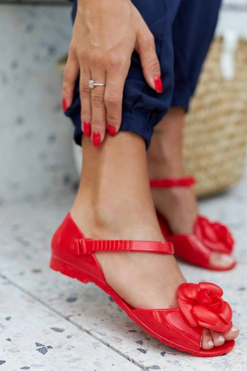 Rote Ballerinas mit Lucchese-Blume