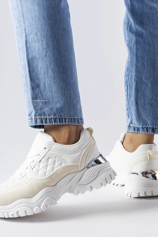 Weiße Sportschuhe mit silbernem...