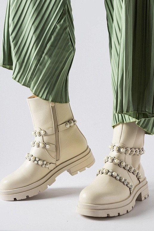 Beige Stiefeletten verziert mit...