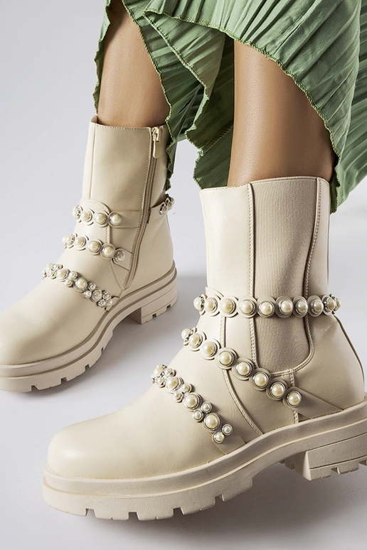 Beige Stiefeletten verziert mit...