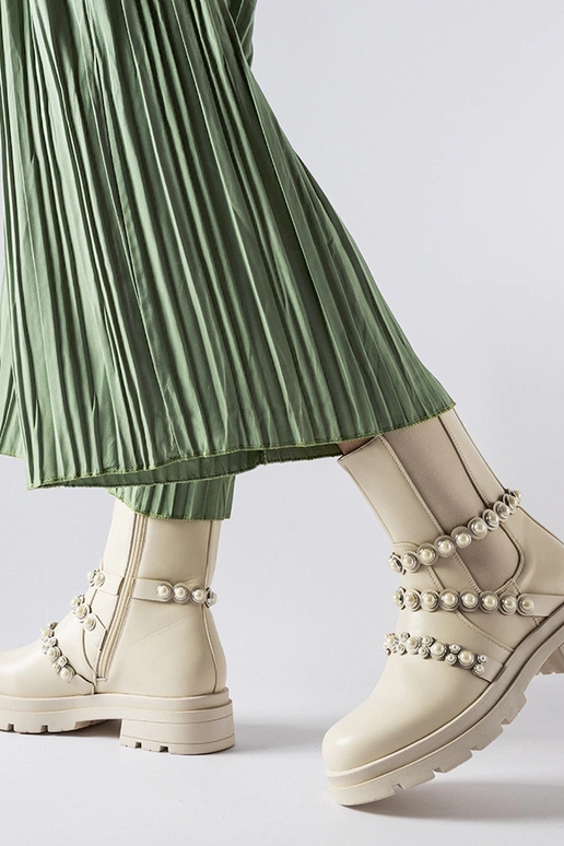 Beige Stiefeletten verziert mit...