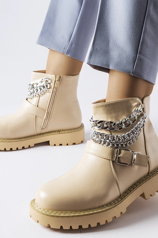 Beige Stiefeletten mit Zierketten...