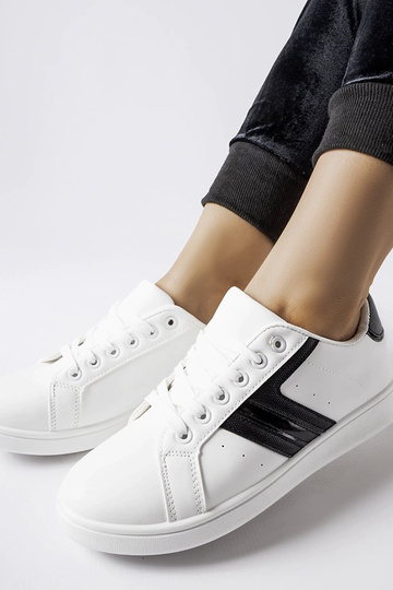 Weiße Sneakers mit... 2