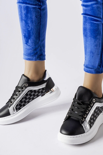 Schwarze Sneaker mit...