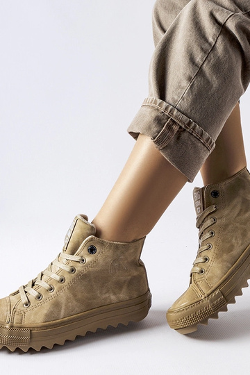 Beige isolierte Sneakers... 2