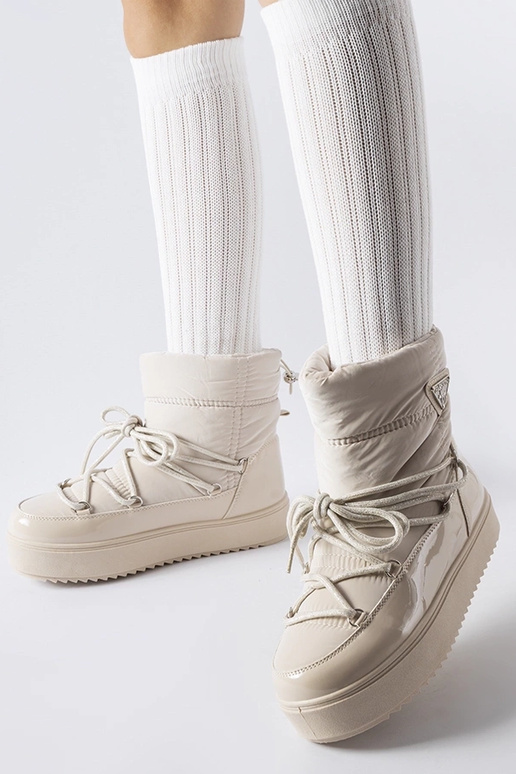 Beige isolierte Schneestiefel mit...