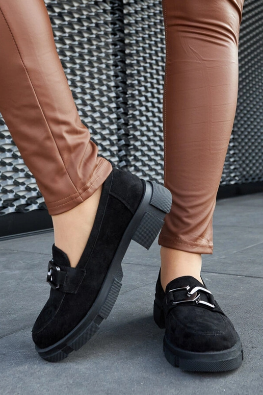 Schwarze massive Mokassins mit... Schwarze massive Mokassins mit...