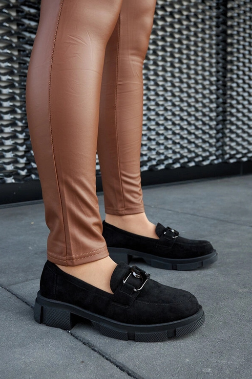 Schwarze massive Mokassins mit... Schwarze massive Mokassins mit...