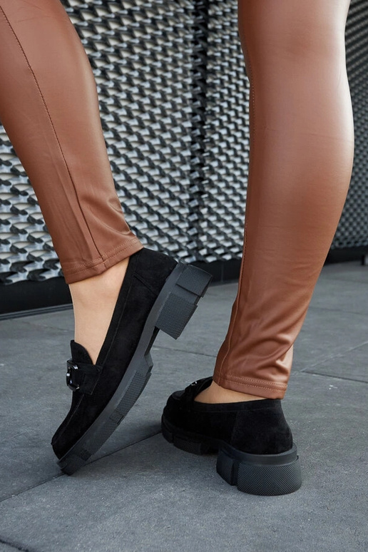 Schwarze massive Mokassins mit... Schwarze massive Mokassins mit...