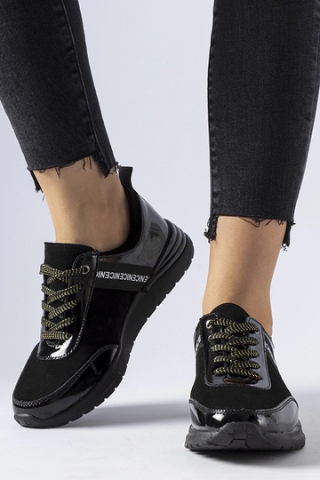 Schwarze Leder-Sneakers... 2