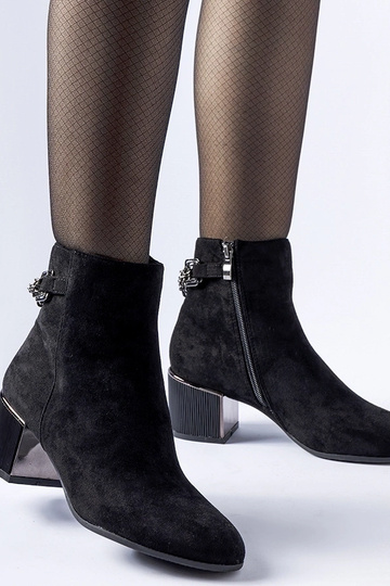 Schwarze Knöchel-Stiefel...