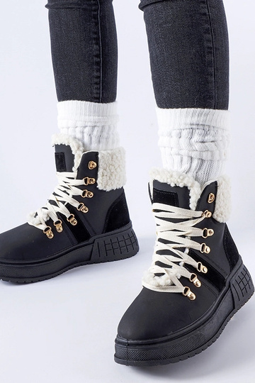 Schwarze Arbeiter auf einer...