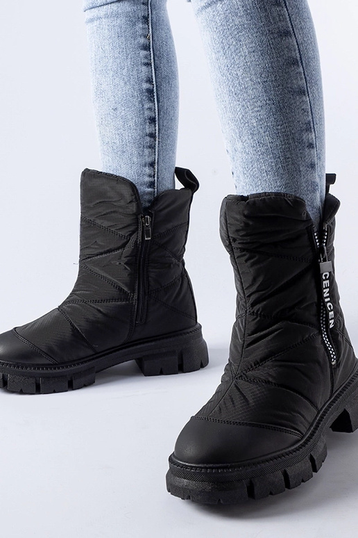 Schwarze gefütterte gesteppte...