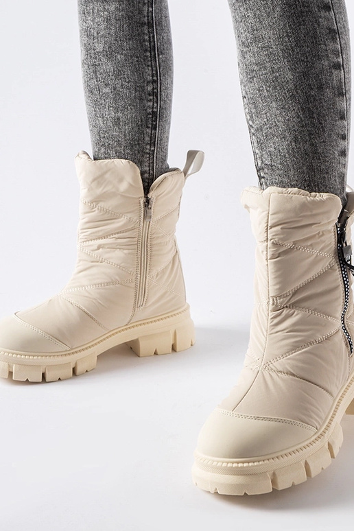 Beige isolierte gesteppte...