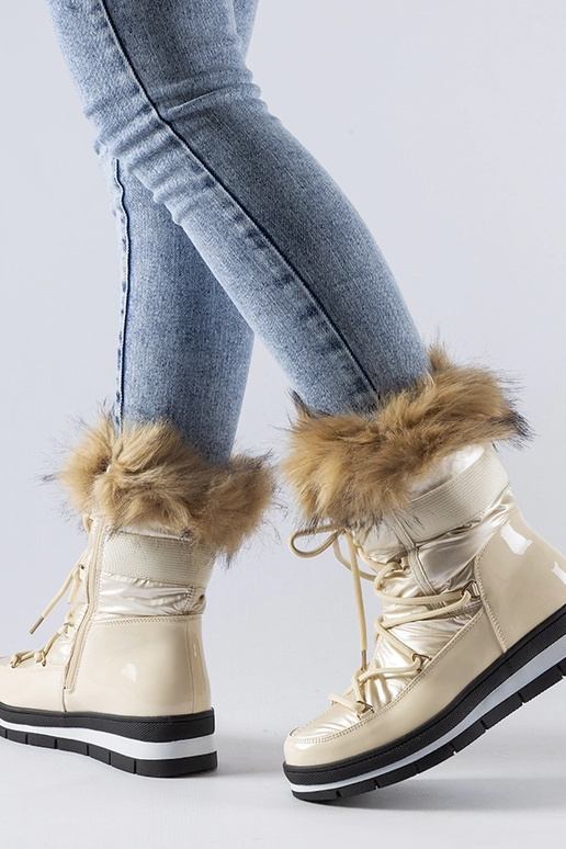 Beige lackierte Schneestiefel mit...
