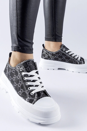 Schwarze Sneaker verziert mit dem Antonella-Monogramm