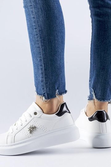 Weiße Sneakers mit...