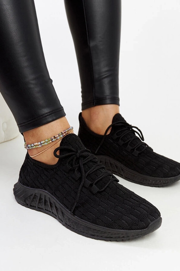 Schwarze Textil-Sneakers...