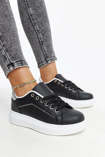 Schwarze Sneakers mit...