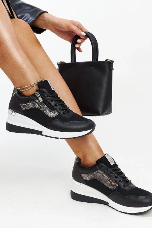 Schwarze Keilsneaker für Damen CROSS...