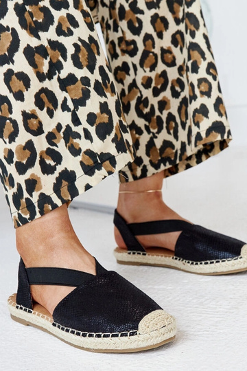 Tharns schwarze Espadrilles... 2