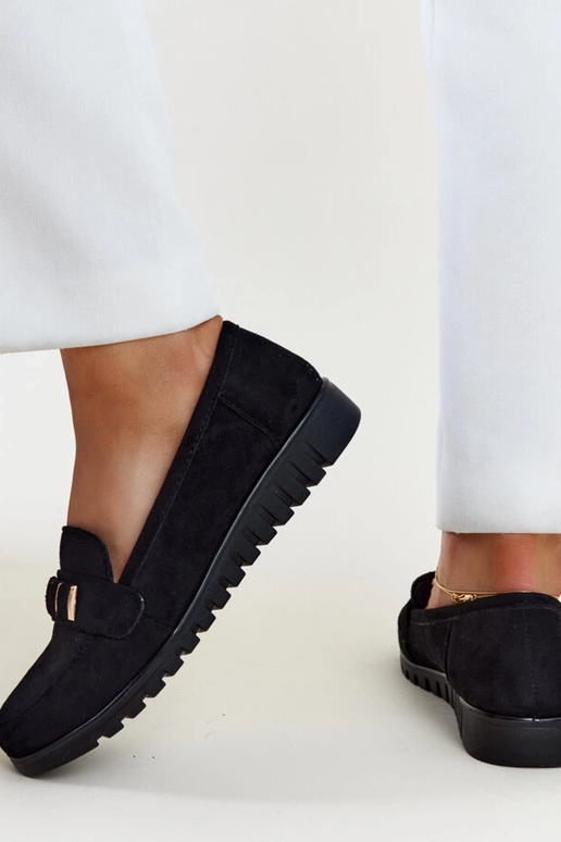 Schwarze Loafer mit dekorativem... Schwarze Loafer mit dekorativem...