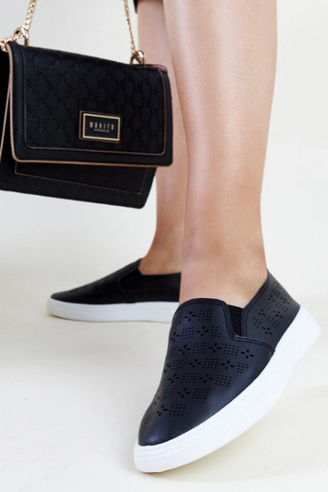 Schwarze Slip-On-Sneakers... 2