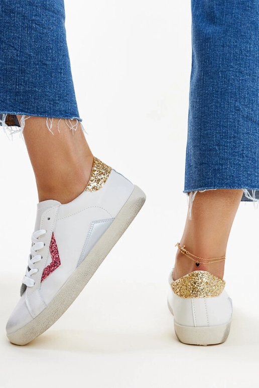 Weiße Sneaker mit „Worn“-Effekt von...