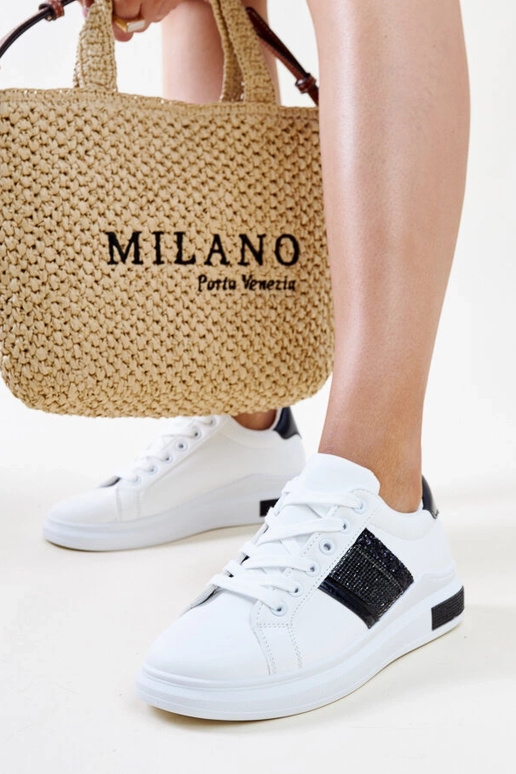 Schwarze und weiße Sneakers mit...