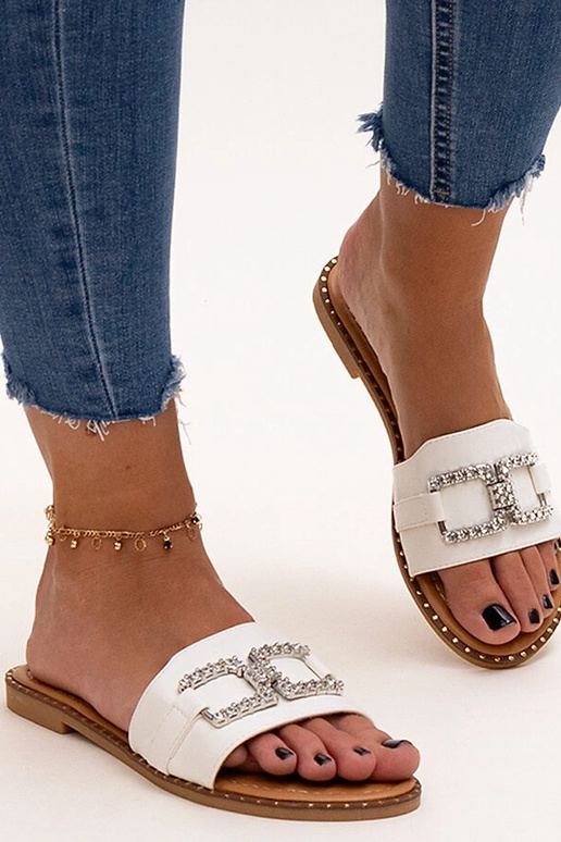 Weiße Pantoletten mit dekorativer...